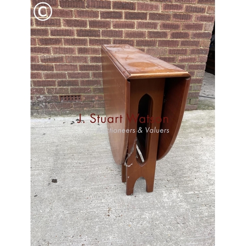 128 - A mid century teak gateleg table