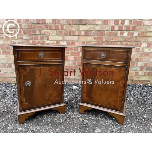 13 - A pair of reproduction mahogany single drawer bedsides