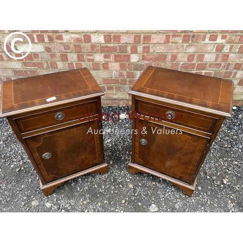 13 - A pair of reproduction mahogany single drawer bedsides