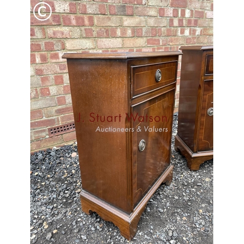 13 - A pair of reproduction mahogany single drawer bedsides