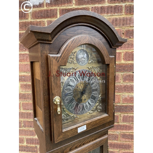 135 - A modern oak cased longcase clock