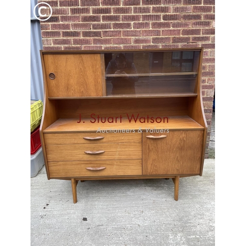 143 - A teak highboy sideboard by avalon