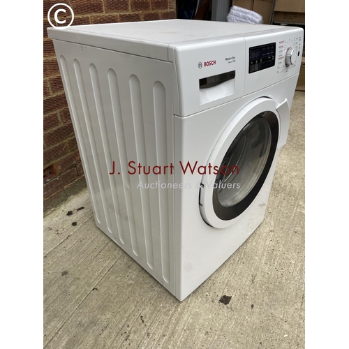 145 - A Bosch washer drier