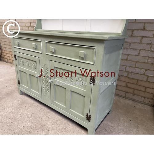 152 - An oak cottage dresser painted green and white