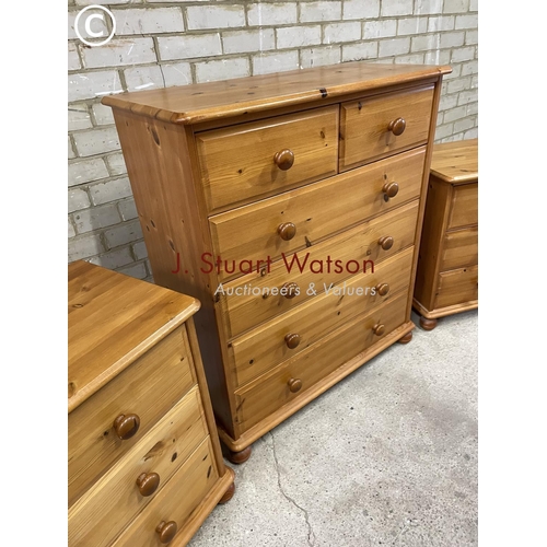 154 - A pine three piece bedroom set consisting of a pine chest of six together with a pair of three drawe... 