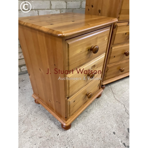 154 - A pine three piece bedroom set consisting of a pine chest of six together with a pair of three drawe... 