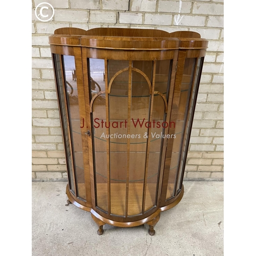 159 - A 1940's walnut display cabinet with three glass internal shelves