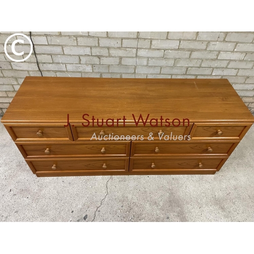 161 - A mid century g plan lowboy chest of seven drawers