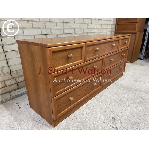 161 - A mid century g plan lowboy chest of seven drawers