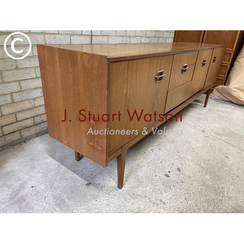 165 - A mid century teak coctail sideboard by Nathan