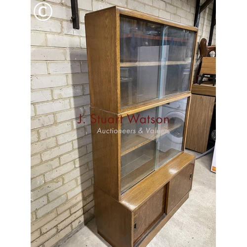 181 - A glazed oak three section bookcase