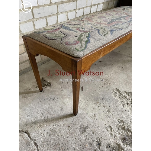 188 - An oak piano stool with tapestry top