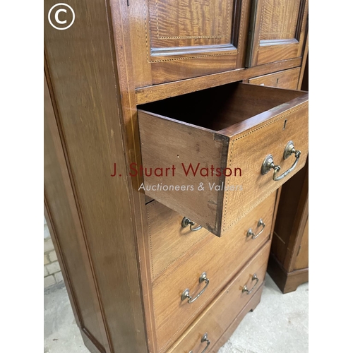 193 - An Edwardian bedroom pair consisting  of a slim linen press over five drawers together with a mirror... 