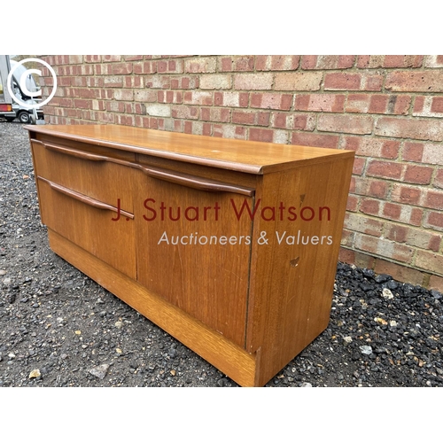 2 - A Macintosh style teak sideboard base unit 122cm wide