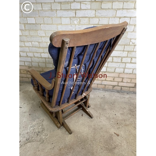 200 - A pine nursery style swing rocking chair