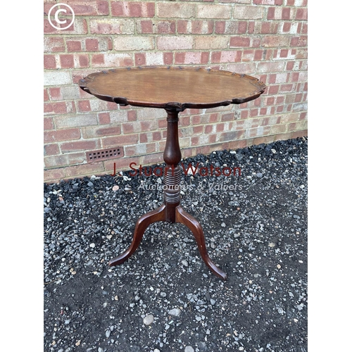 24 - A Georgian mahogany pie crust occasional table