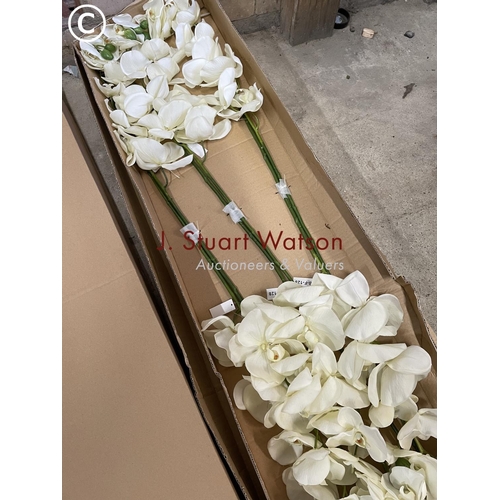 244 - A box of six white artificial orchids