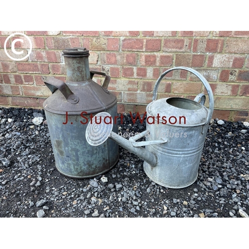 27 - Vintage oil can and water canister