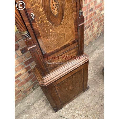 308 - A Victorian oak cased longcase clock with hand painted dial, 3 weights, key and pendulum