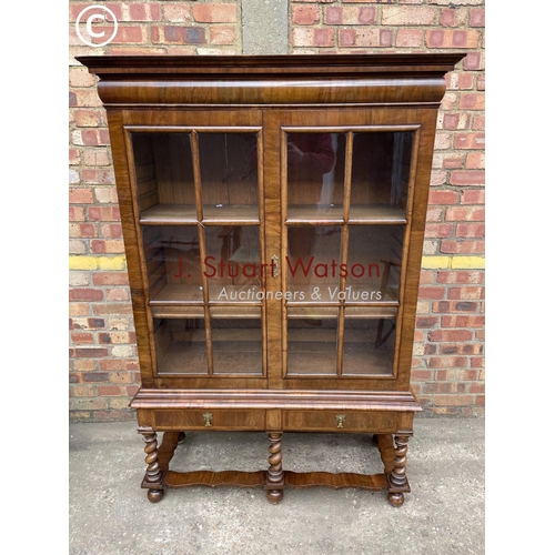 314 - A reproduction walnut display cabinet on two drawer stand with two oak adjustable shelves   110x44x1... 