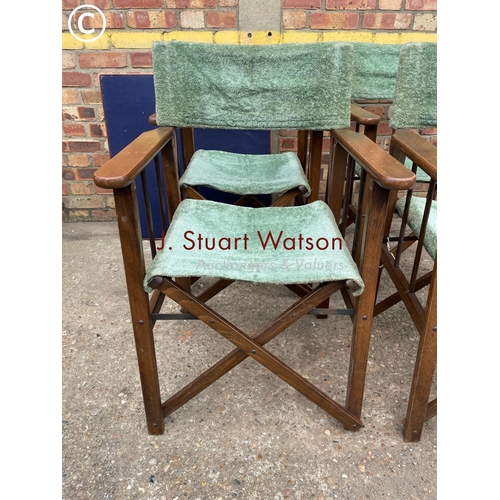 316 - Four folding directors style chairs together with a card table