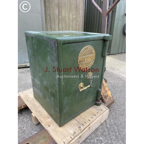 323 - A large antique milners safe with keys 49x48x64