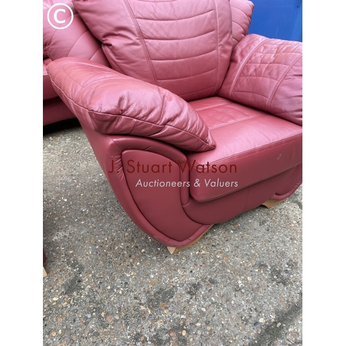 324 - A large modern red leather three piece lounge suite consisting of three starter sofa, two seater sof... 