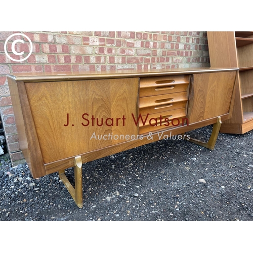 33 - A mid century teak sideboard by Elliots of Newbury  186x45x80