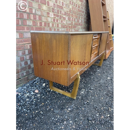 33 - A mid century teak sideboard by Elliots of Newbury  186x45x80