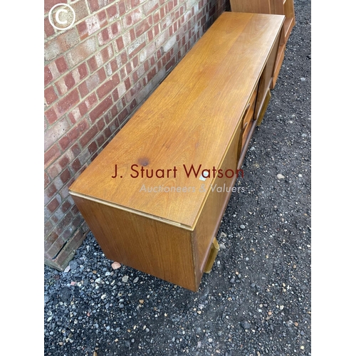 33 - A mid century teak sideboard by Elliots of Newbury  186x45x80