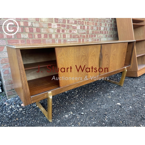 33 - A mid century teak sideboard by Elliots of Newbury  186x45x80