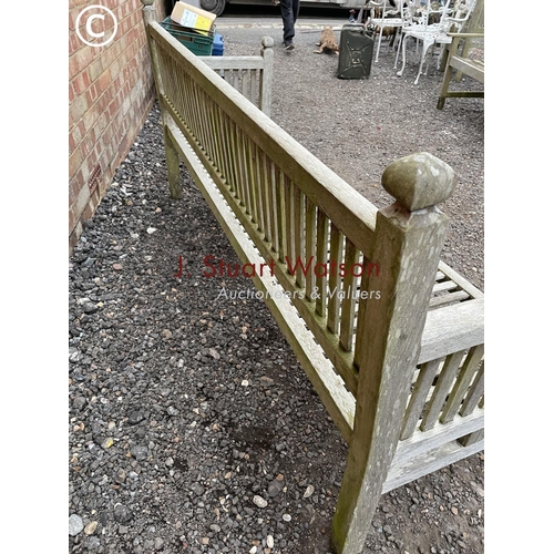 335 - A long hardwood country house style garden bench 190cm