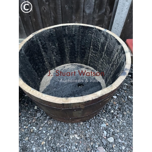 349 - A pair of Scottish oak half whisky barrel planters