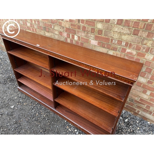 352 - A large reproduction mahogany open cromted bookcase with adjustable shelves 182x30X110