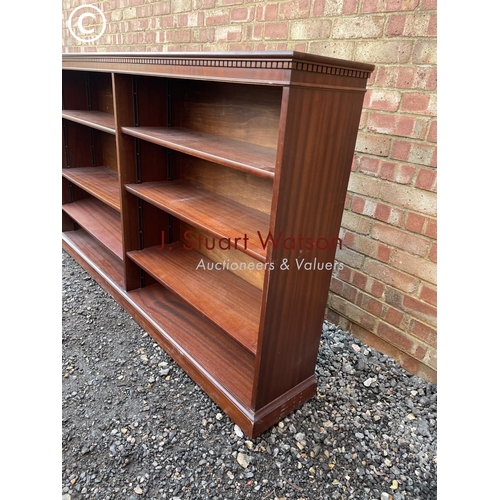 352 - A large reproduction mahogany open cromted bookcase with adjustable shelves 182x30X110