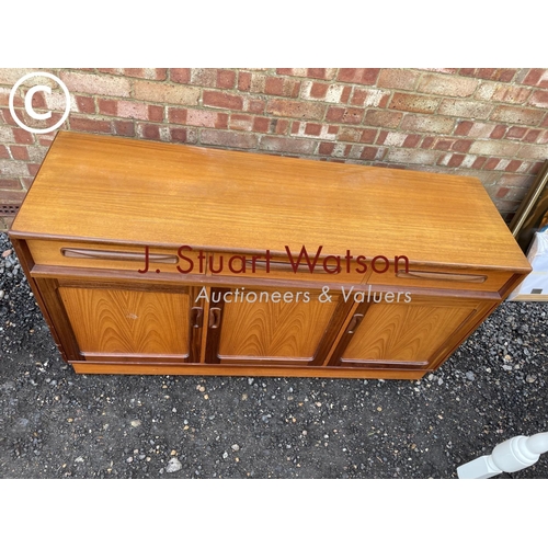 364 - A g plan  teak sideboard having three drawers over three cupboards