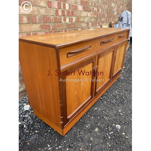 364 - A g plan  teak sideboard having three drawers over three cupboards