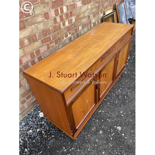 364 - A g plan  teak sideboard having three drawers over three cupboards