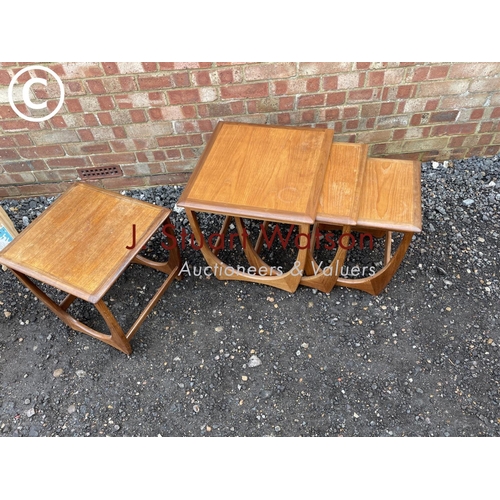 365 - A g plan teak nest of three tables togther with another matching side table