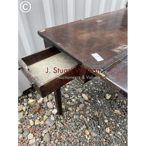 383 - A Georgian mahogany fold over tea table