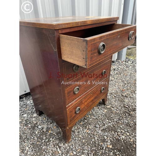 385 - An inlaid mahogany chest of four drawers