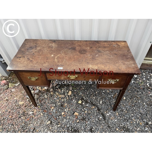 388 - A mahogany three drawer lowboy table