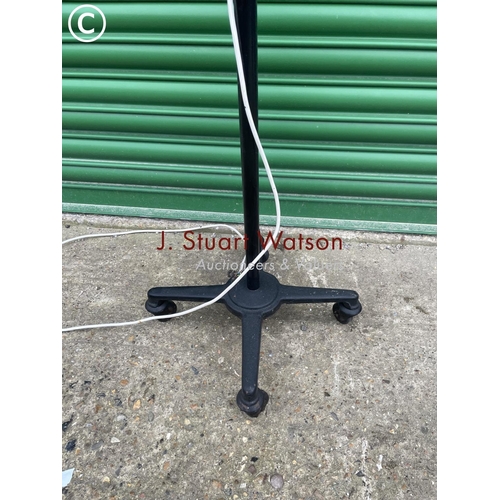 392 - A vintage black floor standing trolley anglepoise work lamp