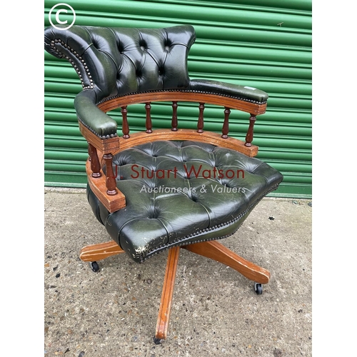 400 - A green leather captains style desk chair