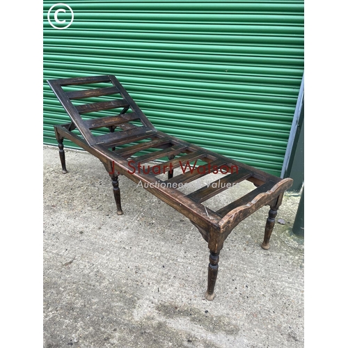 403 - An early 20th century oak treatment bed with adjustable position head