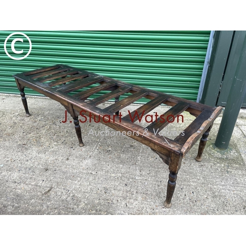 403 - An early 20th century oak treatment bed with adjustable position head