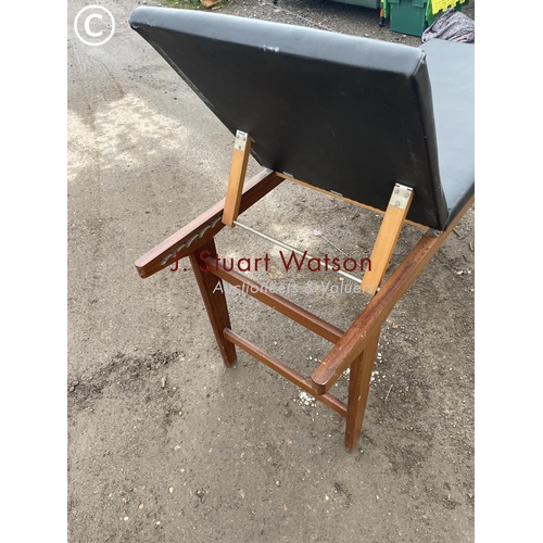 405 - A mid century teak treatment couch with black vinyl top