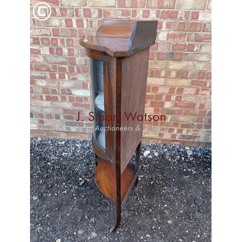 53 - An Edwardian inlaid corner cabinet