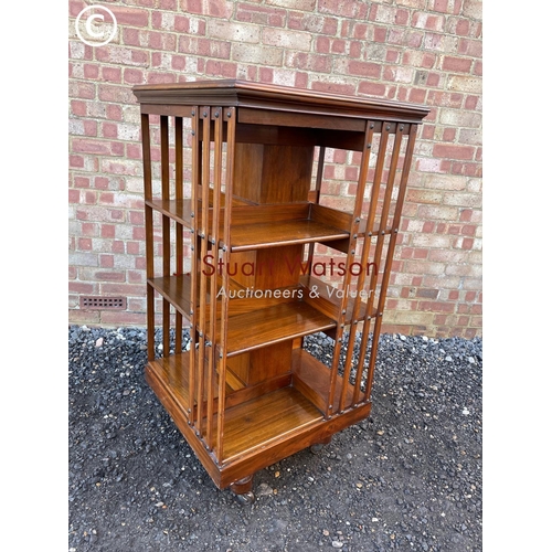 57 - An Edwardian revolving bookcase  120cm high