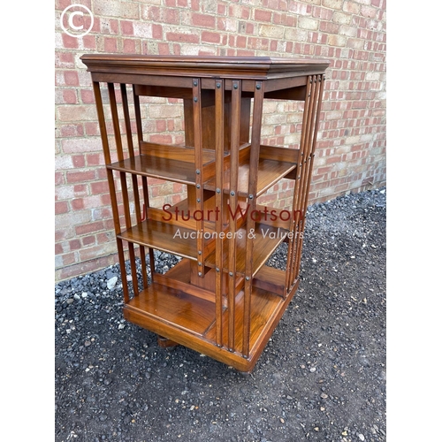 57 - An Edwardian revolving bookcase  120cm high